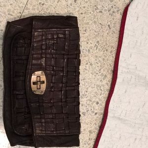 Monserrat de Luca leather, woven clutch purse